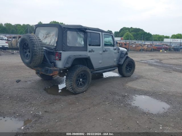 1C4BJWDG7EL102479 Jeep Wrangler Unlimited Sport