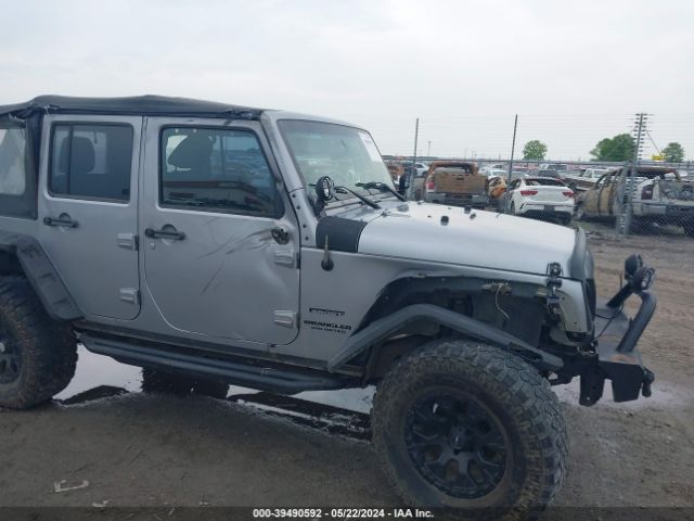1C4BJWDG7EL102479 Jeep Wrangler Unlimited Sport