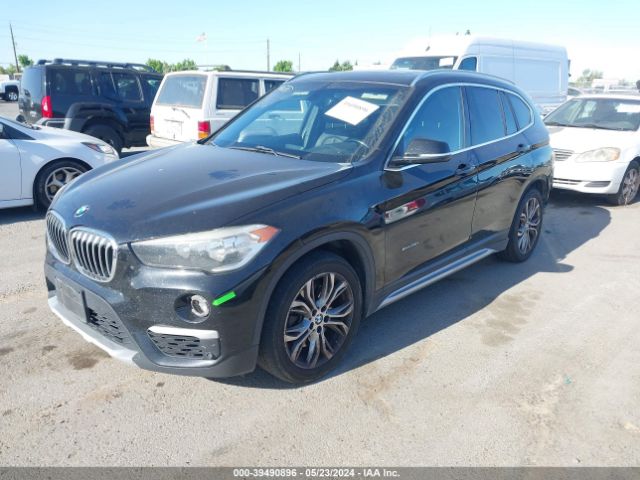 WBXHT3C30G5E56682 BMW X1 Xdrive28i