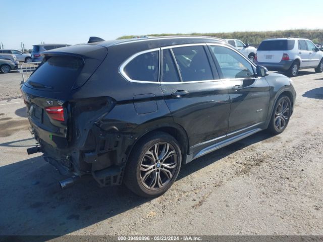 WBXHT3C30G5E56682 BMW X1 Xdrive28i