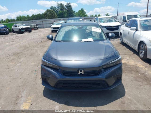 2HGFE2F23PH560585 Honda Civic Lx