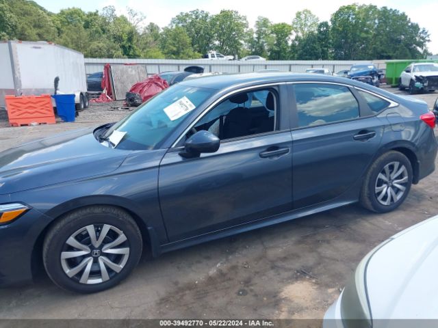 2HGFE2F23PH560585 Honda Civic Lx