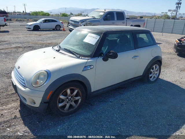 2010 MINI COOPER WMWMF3C53ATZ64033 Photo 1