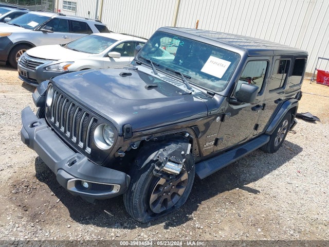 1C4HJXEG4JW165711 Jeep Wrangler Unlimited Sahara 4x4