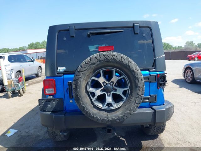 1C4BJWDGXFL631748 Jeep Wrangler Unlimited Sport