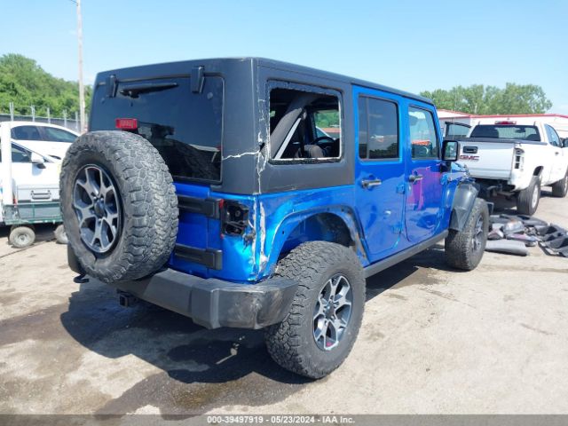 1C4BJWDGXFL631748 Jeep Wrangler Unlimited Sport