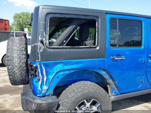 1C4BJWDGXFL631748 Jeep Wrangler Unlimited Sport