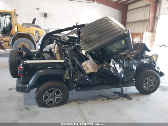 1C4HJXDG0LW257953 Jeep Wrangler Unlimited Black And Tan 4x4