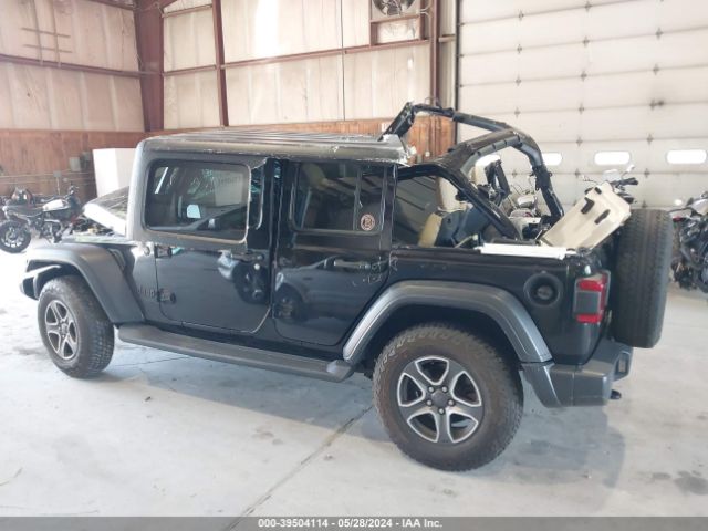 1C4HJXDG0LW257953 Jeep Wrangler Unlimited Black And Tan 4x4