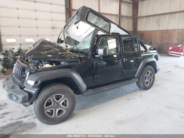 1C4HJXDG0LW257953 Jeep Wrangler Unlimited Black And Tan 4x4