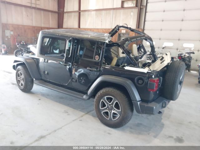 1C4HJXDG0LW257953 Jeep Wrangler Unlimited Black And Tan 4x4