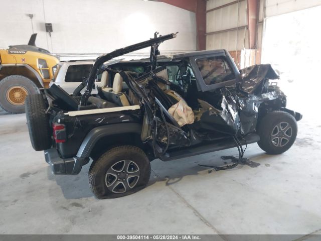 1C4HJXDG0LW257953 Jeep Wrangler Unlimited Black And Tan 4x4