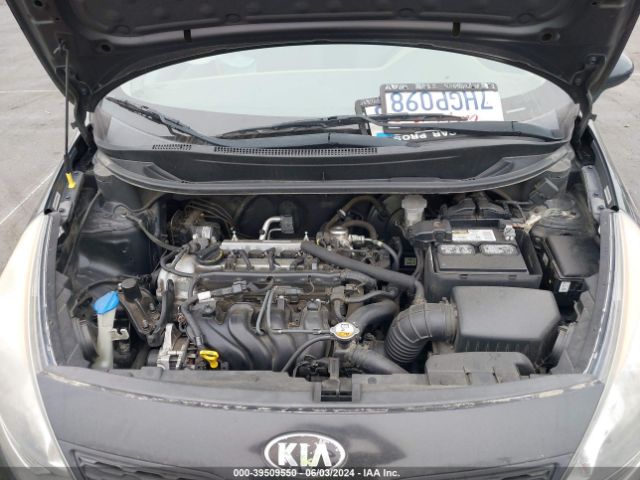 KNADM5A3XE6409586 KIA RIO LX