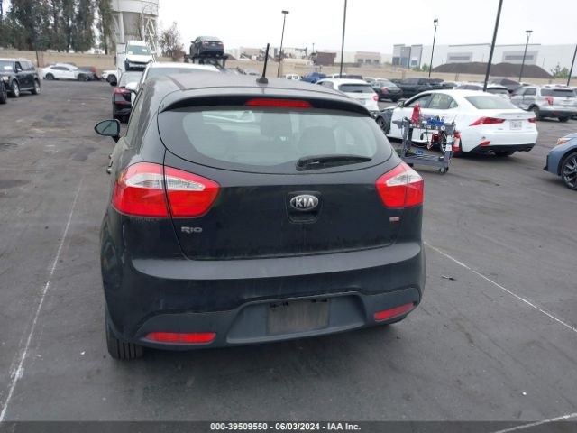 KNADM5A3XE6409586 KIA RIO LX