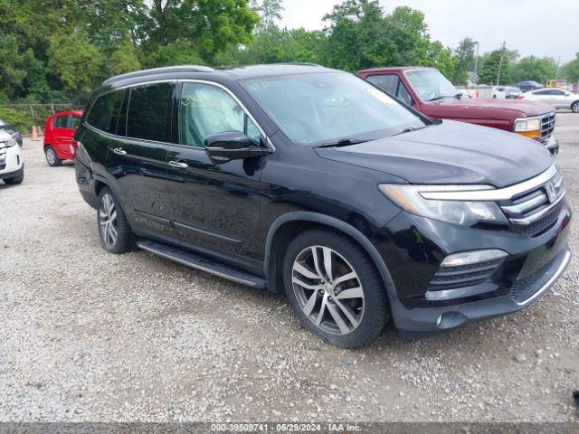 Auction sale of the 2016 Honda Pilot Touring, vin: 5FNYF6H98GB095202, lot number: 39509741