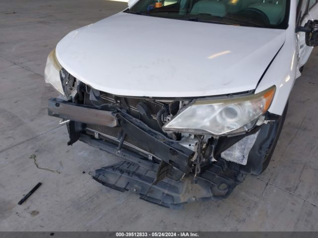 4T1BD1FK9EU108768 Toyota Camry Hybrid Le