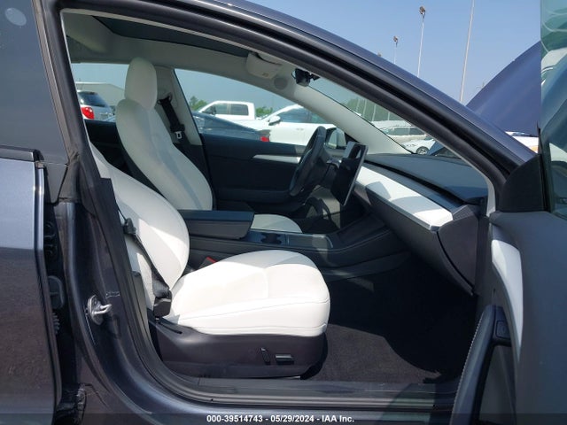 2023 TESLA MODEL 3 5YJ3E1EAXPF414646 Photo 4