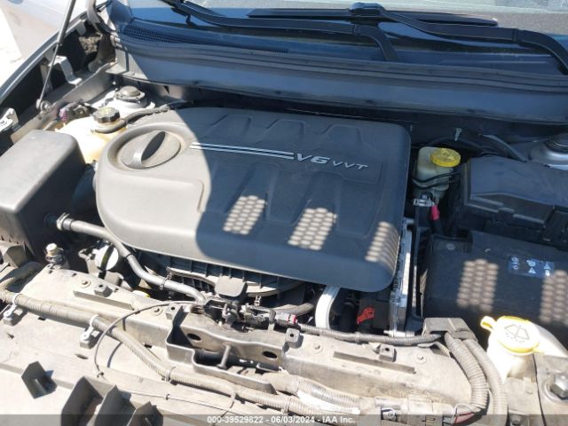 1C4PJLCSXEW293100 Jeep Cherokee Altitude