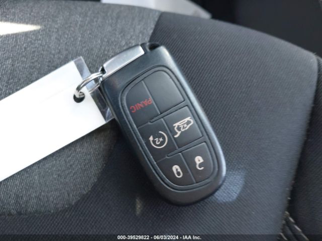 1C4PJLCSXEW293100 Jeep Cherokee Altitude