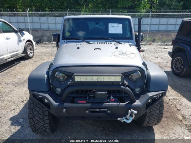 1C4BJWDG7FL765150 Jeep Wrangler Unlimited Sport