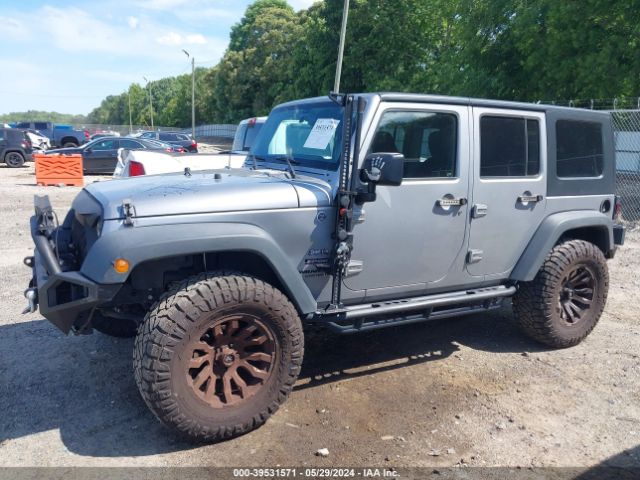 1C4BJWDG7FL765150 Jeep Wrangler Unlimited Sport