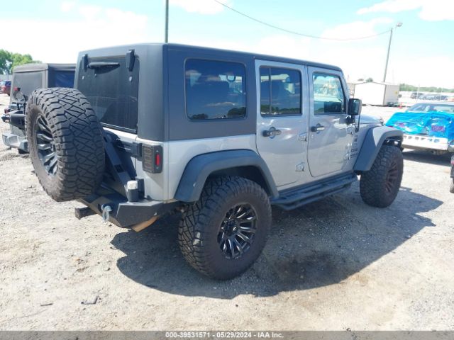 1C4BJWDG7FL765150 Jeep Wrangler Unlimited Sport