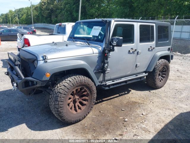 1C4BJWDG7FL765150 Jeep Wrangler Unlimited Sport