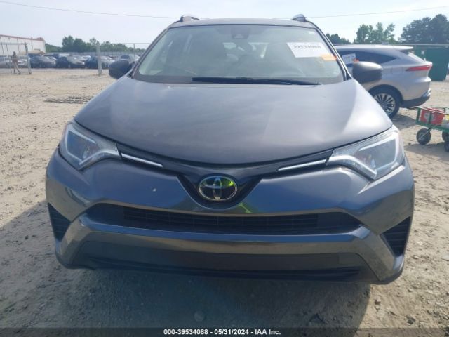 JTMZFREV1JJ180969 Toyota RAV4 LE