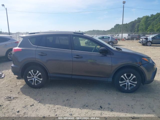 JTMZFREV1JJ180969 Toyota RAV4 LE
