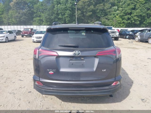 JTMZFREV1JJ180969 Toyota RAV4 LE