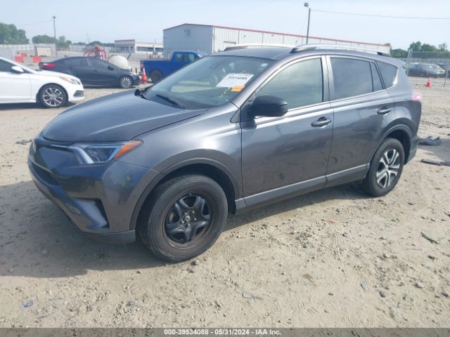 JTMZFREV1JJ180969 Toyota RAV4 LE