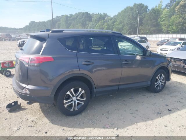 JTMZFREV1JJ180969 Toyota RAV4 LE