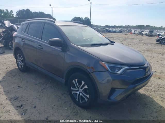 JTMZFREV1JJ180969 Toyota RAV4 LE