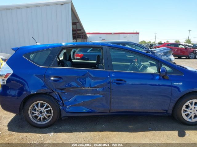 JTDZN3EUXEJ015435 Toyota Prius V Three