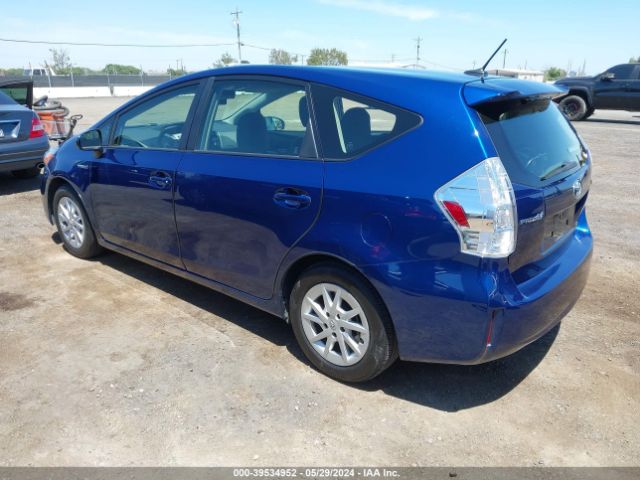 JTDZN3EUXEJ015435 Toyota Prius V Three