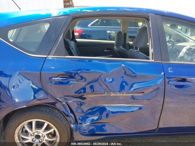 JTDZN3EUXEJ015435 Toyota Prius V Three