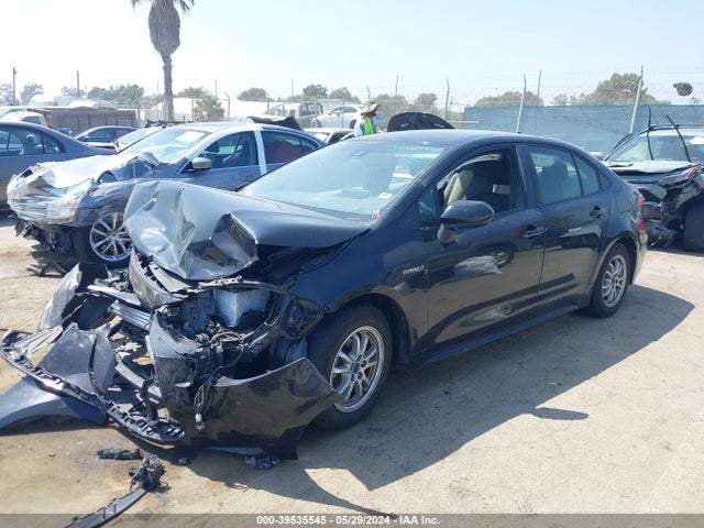 Toyota Corolla Hybrid Le 2021 JTDEAMDE8MJ016916 Image 2