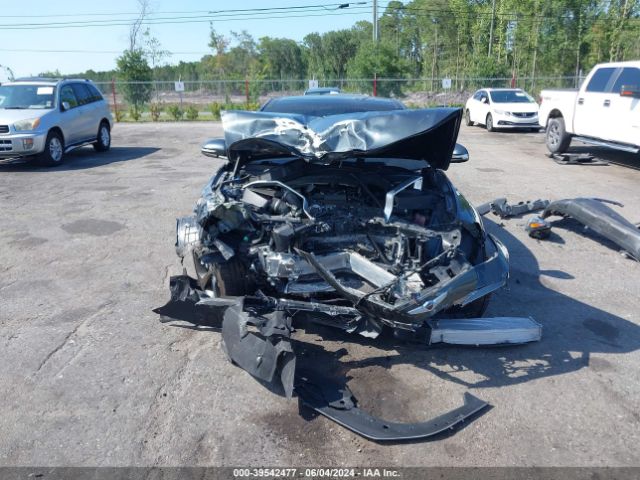 KMTG34LE2LU058176 Genesis G70 3.3t Rwd