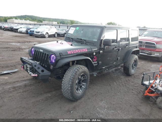 1C4BJWDG7GL154357 Jeep Wrangler Unlimited Sport