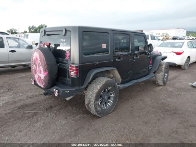 1C4BJWDG7GL154357 Jeep Wrangler Unlimited Sport