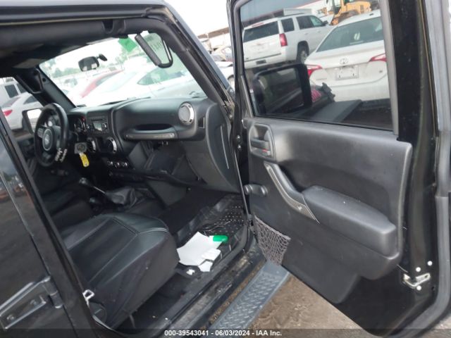 1C4BJWDG7GL154357 Jeep Wrangler Unlimited Sport
