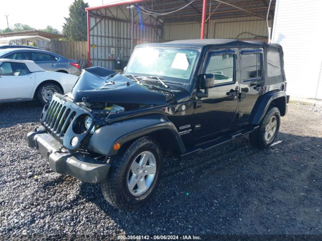 1C4HJWDG8GL184011 Jeep Wrangler Unlimited Sport