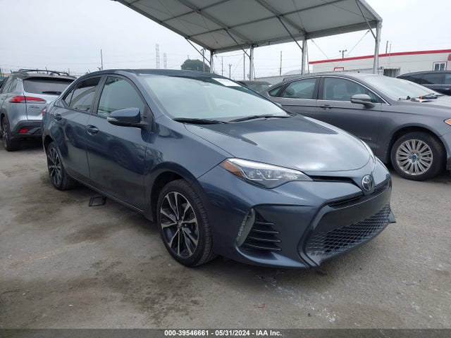 Toyota COROLLA SE 2018 5YFBURHE9JP748271 Image 1