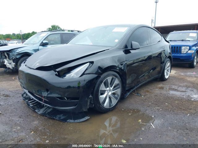 2023 TESLA MODEL Y 7SAYGDEE8PF704424 Photo 1