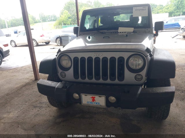 1C4BJWDG7EL130668 Jeep Wrangler Unlimited Sport