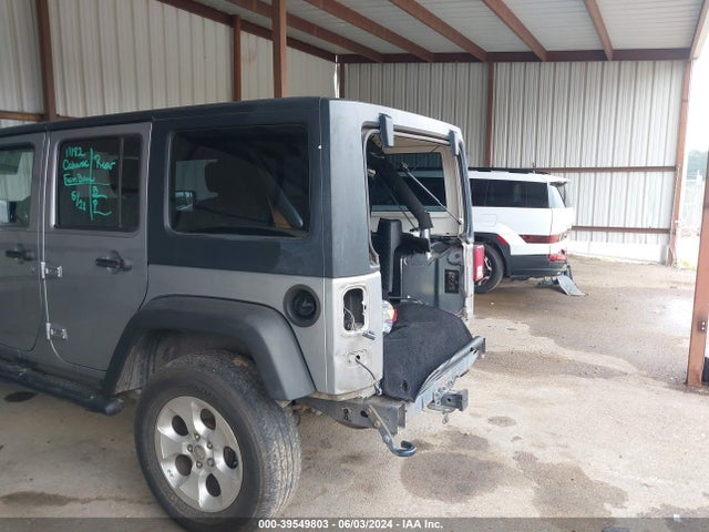 1C4BJWDG7EL130668 Jeep Wrangler Unlimited Sport