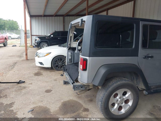 1C4BJWDG7EL130668 Jeep Wrangler Unlimited Sport