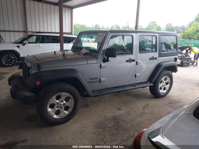 1C4BJWDG7EL130668 Jeep Wrangler Unlimited Sport