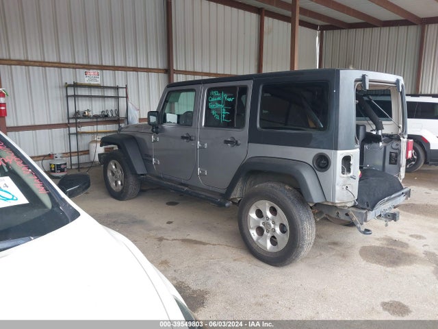 1C4BJWDG7EL130668 Jeep Wrangler Unlimited Sport
