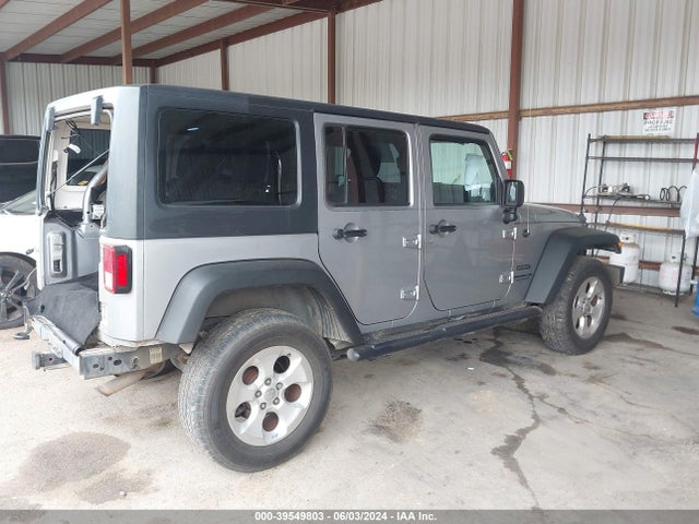 1C4BJWDG7EL130668 Jeep Wrangler Unlimited Sport